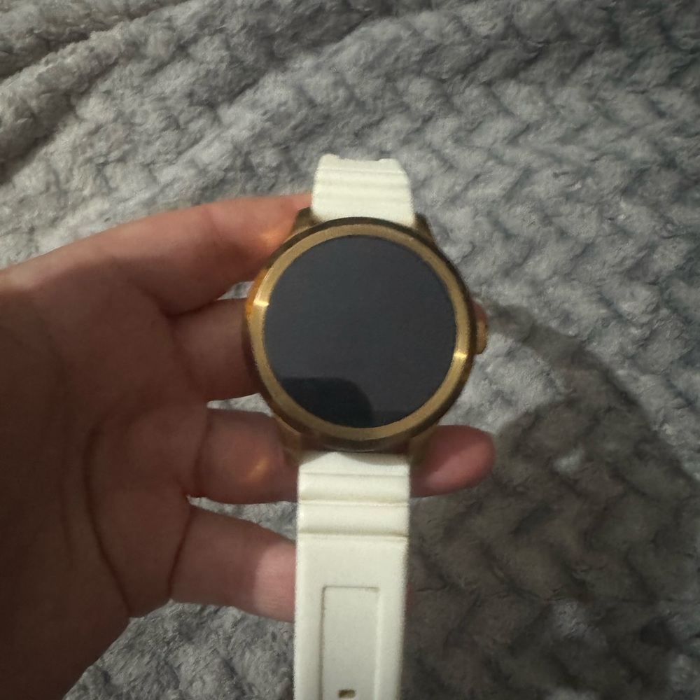 Gold and White Fossil Q Venture Gen 3 Smart
Watches Smartwatch